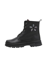 Bottines montantes en cuir noir avec lacets, semelle épaisse et un design de fleur scintillante sur le côté extérieur.