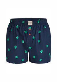 Boxer shorts blu navy con motivo floreale verde, vita elasticizzata e due bottoni rossi davanti, realizzati in tessuto leggero.