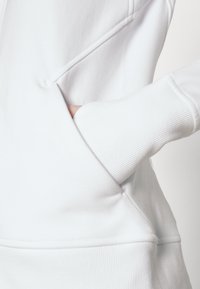 Athleta TRIUMPH HOODIE - Camisola com fecho - white