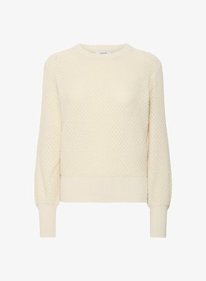 Svetlo smetanový textúrovaný sveter s vzorom včelieho plástu, rebrovanými manžetami a lemom, s klasickým okrúhlym výstrihom.