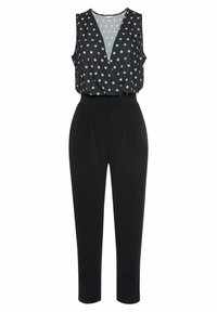Svart byxdress med ärmlös topp med djup V-ringning och prickigt mönster, kombinerat med tapered byxor och en slät textur.
