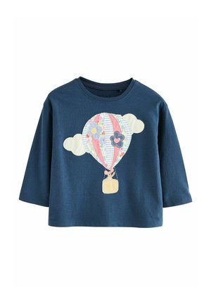 Navy cotton long-sleeve shirt featuring an embroidered hot air balloon design with colorful stripes, flowers, and clouds.
