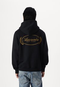 Abercrombie & Fitch SCRIPT LOGO - Felpa con cappuccio - casual black