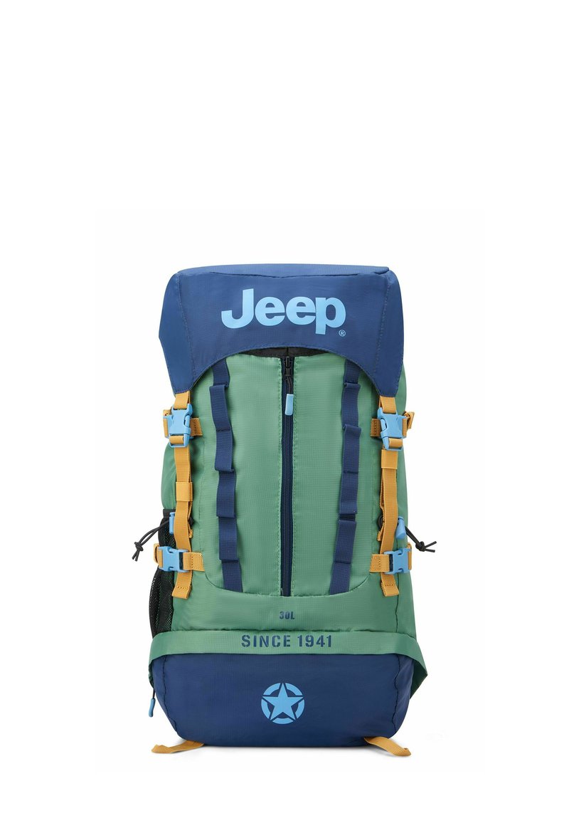 Zaino realizzato in tessuto resistente, verde e blu navy. Presenta un ampio scomparto con cerniera, spallacci regolabili e dettagli con logo.