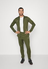 Nike Performance M NK DRY ACD21 TRK SUIT K - Fato de treino - rough green/white
