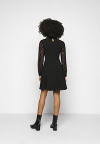 ONLY Petite Žerzejové šaty - black