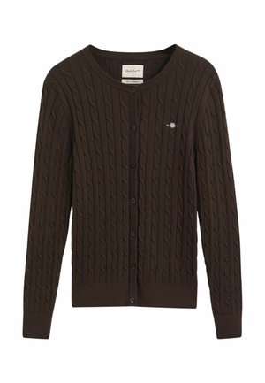 Dark brown cable-knit cardigan with a round neck, front buttons, ribbed cuffs, and a small embroidered logo on the left chest.