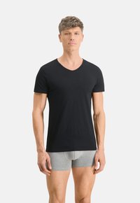 Puma 4ER PACK - BASIC V-NECK KURZARM UNI - Undertrøjer - schwarz weiß