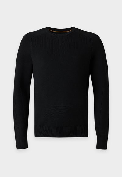 Pull noir en maille à manches longues avec col rond, poignets et ourlet côtelés, présenté sur un fond uni gris clair.
