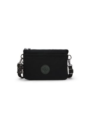 Borsa a tracolla nera in nylon con chiusura a zip, caratterizzata da un logo rotondo in rilievo e una tracolla regolabile con hardware metallico. Design compatto.