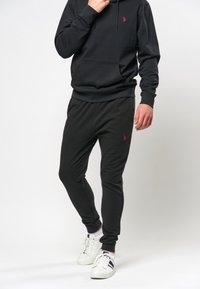 U.S. Polo Assn. ASHLAR - Treniņtērpa apakšdaļas - black