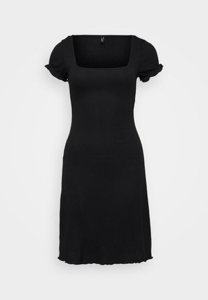 Robe noire avec un décolleté carré et de courtes manches bouffantes. Fabriquée en tissu côtelé, elle présente un ourlet évasé aux bords festonnés.