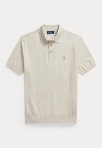Chemise Polo Ralph Lauren beige clair à manches courtes avec col, trois boutons et petit logo brodé sur la poitrine gauche.