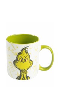 Ceramic mug featuring a green and white design with the Grinch's face, a smooth finish, and a vibrant green interior.
