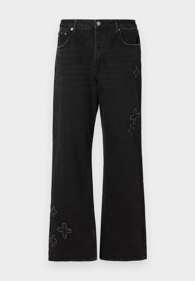 Svarta jeans i denim med bred passform, prydda med broderade korsmönster i en ljusare nyans. Femfickorsdesign och knappstängning.