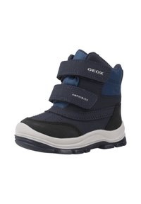 Botas infantiles en azul marino y negro con doble tira de Velcro, etiquetadas como Geox y Amphibiox, con una suela rugosa en blanco y negro.