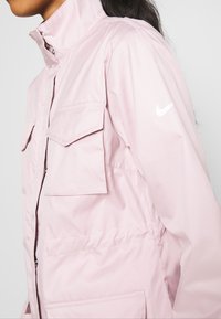 Nike Sportswear Tunn jacka - lilac