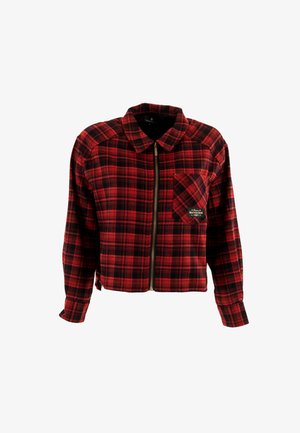 Giacca cropped a quadretti rossi e neri con colletto, zip frontale e taschino sul petto con patch del logo. Tessuto morbido e dalla texture.