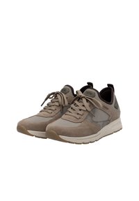 Beige athletic shoes with a mix of suede and mesh materials, round toe, lace-up front, padded collar, and textured rubber sole.