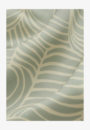 Világoszöld alapú szövet, krémszínű levélmintával. A felület sima, enyhe fényességgel bír.