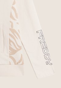 Freddy CHIUSURA ZIP E CON INSERTI FLOREALI - Felpa con zip - white sand allover leaves w s