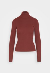 Ribbad polotröja i en dämpad röd nyans, med långa ärmar och en figurnära silhuett med en texturerad yta.