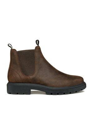 Stivale Chelsea in pelle marrone con pannelli elastici laterali, linguette di estrazione e suola in gomma nera con battistrada testurizzato per una buona presa.