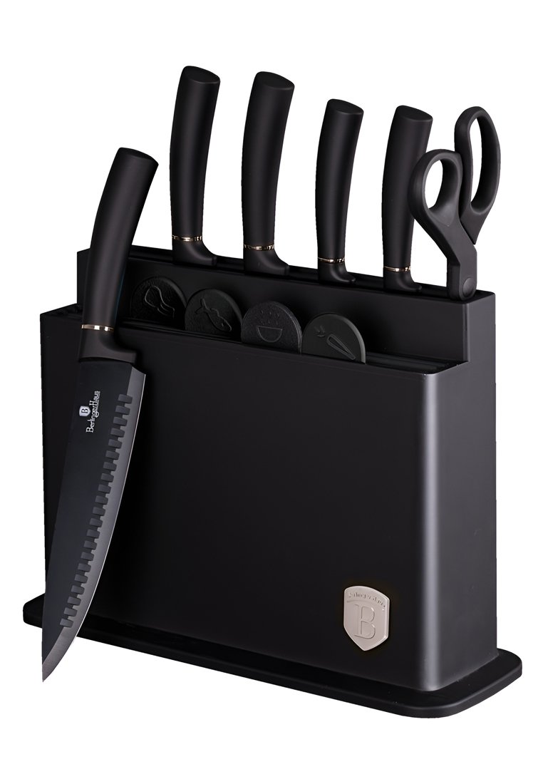 Czarny zestaw bloków noży z pięcioma nożami, nożyczkami kuchennymi i okrągłymi osłonami na ostrza; charakteryzuje się eleganckim wzornictwem i matowym wykończeniem z fakturą.