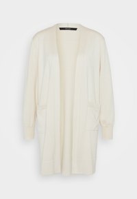 Lång, öppen cardigan i krämfärg, tillverkad av mjukt tyg. Har långa ärmar, ribbade muddars och två framfickor.