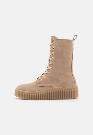 Bottines à plateau - beige