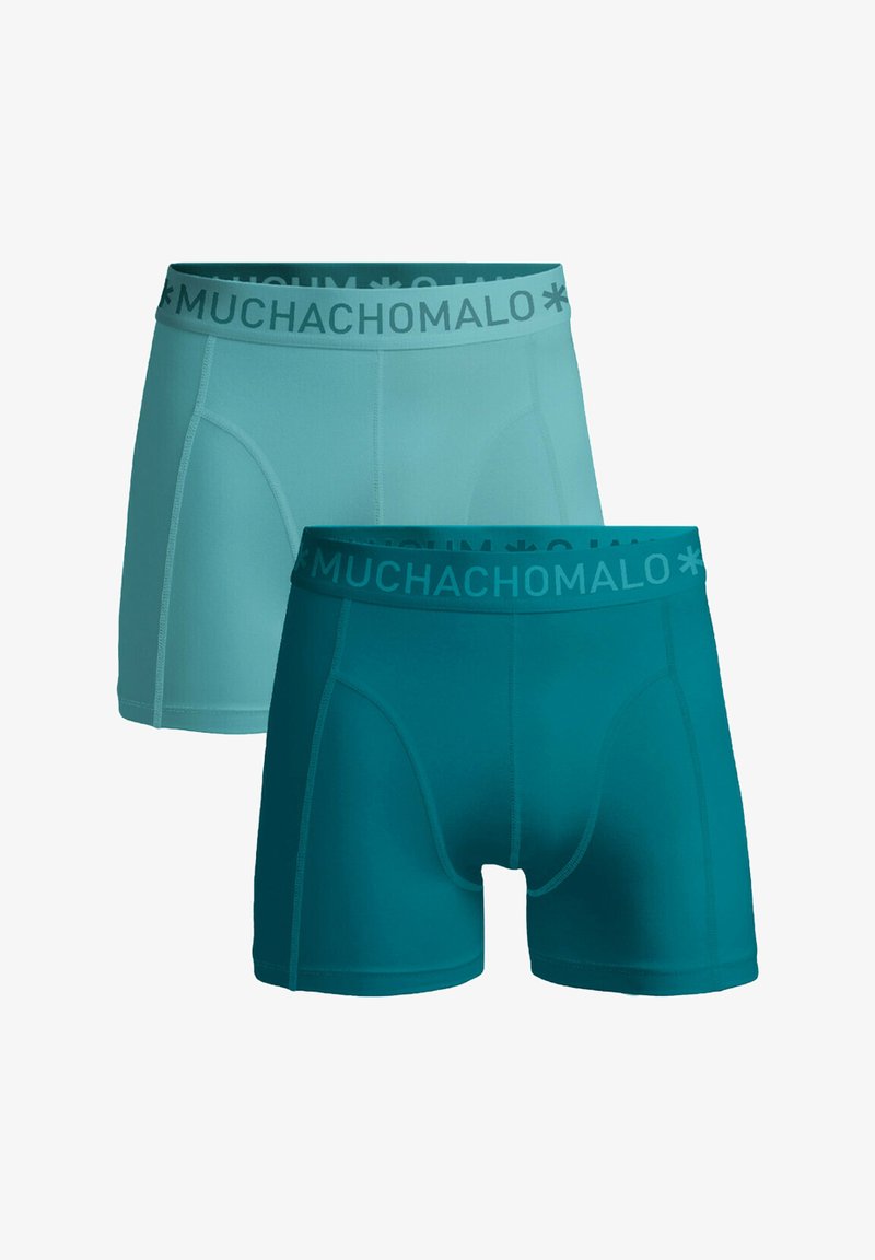 Dva para bokseric: ena v svetlo modri in druga v temno zeleni barvi. Vsake imajo mehak elastični pas z blagovno znamko "MUCHACHO".