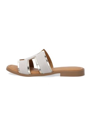 Flat sandal with white faux leather upper, metallic silver accents, and open-toe design. Brown faux leather insole and lightweight outsole.