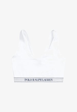 Brassière en tissu blanc et doux avec des bretelles larges et un décolleté en U. Elle présente une bande marine avec le logo "POLO RALPH LAUREN" en bas.