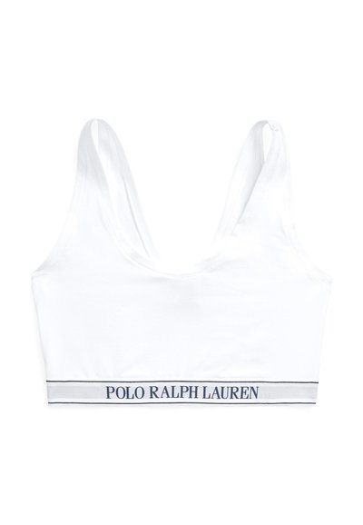 Λευκό, απαλό σουτιέν από ύφασμα με φαρδιές τιράντες και στρογγυλή λαιμόκοψη. Διαθέτει μπλε σκούρα λωρίδα με το λογότυπο "POLO RALPH LAUREN" στο κάτω μέρος.
