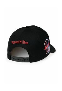 Black snapback cap with red embroidered "Mitchell & Ness" and multi-colored graphic detailing. Features a plastic adjustable strap.