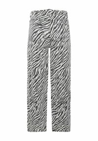 Juoda ir balta zebra rašto kelnių pora su laisvu kirpimu, turinti dvi nugarines kišenes ir matomus siūlų detalizavimus.