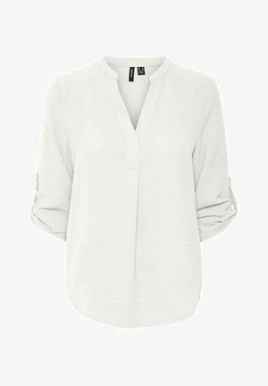 Blusa ligera de color gris claro con escote en V, mangas tres cuartos dobladas y un dobladillo ligeramente curvado. Presenta una tela suave y texturizada.