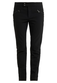 Svarta byxor gjorda av ett töjbart material. Har två fickor med dragkedja, en platt midja och en slim fit-design med avsmalnande ben.