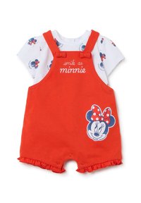 Mono rojo con camiseta blanca debajo, con patrones de Mickey Mouse en azul, rojo y blanco, y un gráfico de Minnie Mouse con texto.