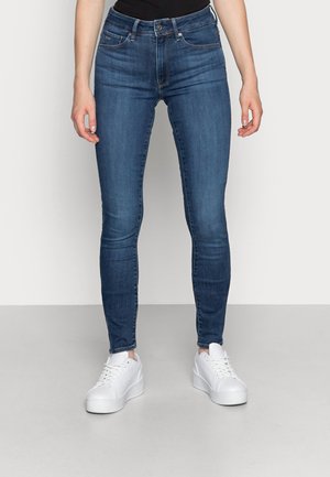 3301 SKINNY - Calças de ganga de corte skinny - medium blue aged