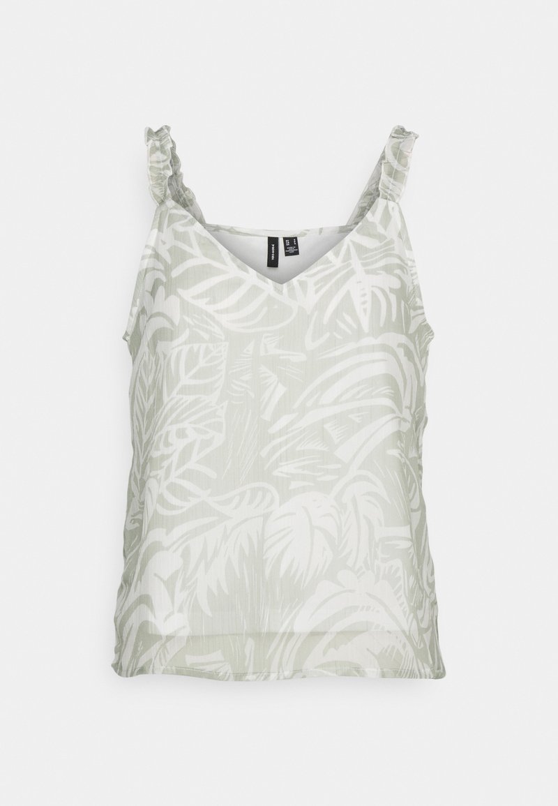 Blouse sans manches vert clair avec bretelles volantées et motif de feuilles tropicales blanches.
