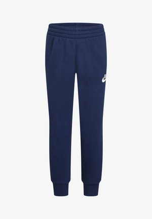 Námornícky modré teplákové nohavice s elastickým pásom, zúženými nohavicami a rebrovanými manžetami. Na boku sa nachádza malé biele logo Nike swoosh.