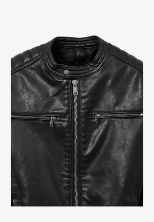 Black leather jacket with quilted shoulder detail, front zipper closure, and two horizontal zippered chest pockets.