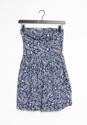 Navy strapless dress featuring a paisley pattern in white and red, with an elasticated waist and gathered skirt design, made of lightweight fabric.