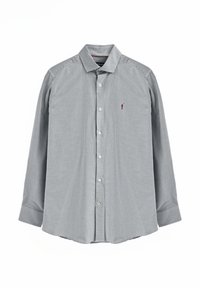 Skjorta med knappar fram i svartvitt gingham-mönster, med krage, långa ärmar och en liten röd logotyp på bröstet.