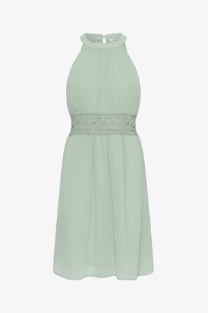 Mouwloze lichtgroene halterjurk met geplooide halslijn en bloemige kanten taillebanddetail, knie-lengte, keyhole knoopsluiting aan de achterkant.