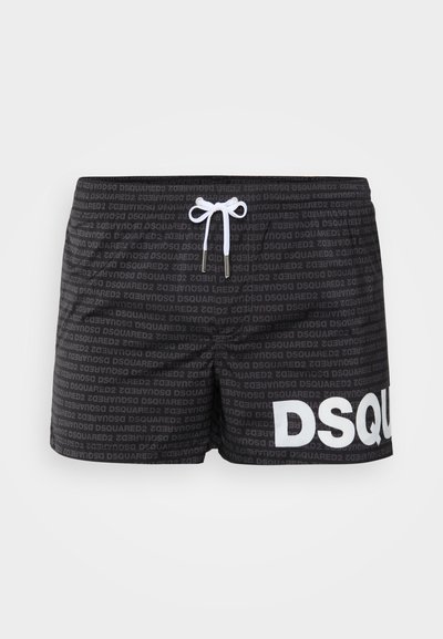 Shorts de bain noirs avec un motif de logo répété, présentant un accent blanc "DSQUARED2", une taille élastique et un cordon de serrage frontal.
