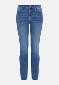 Jeans skinny in denim blu chiaro. Presentano un classico design a cinque tasche, chiusura con zip e una leggera scoloritura per un aspetto vissuto.
