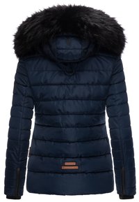 Navy puffer jacket with horizontal stitching, black faux fur hood, and zippered side pockets. Features logo tag on left side.