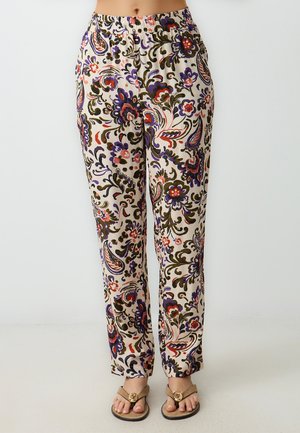 Pantaloni floreali leggeri con elastico in vita, su sfondo crema, caratterizzati da intricati motivi paisley in viola, verde e rosa e una vestibilità rilassata.